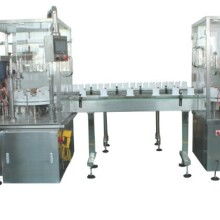  上海凌隆飲料機(jī)械廠 主營(yíng) 旋蓋機(jī) 液體灌裝機(jī)